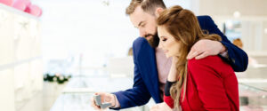a couple looking at engagement rings together