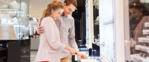 a couple shopping for engagement rings