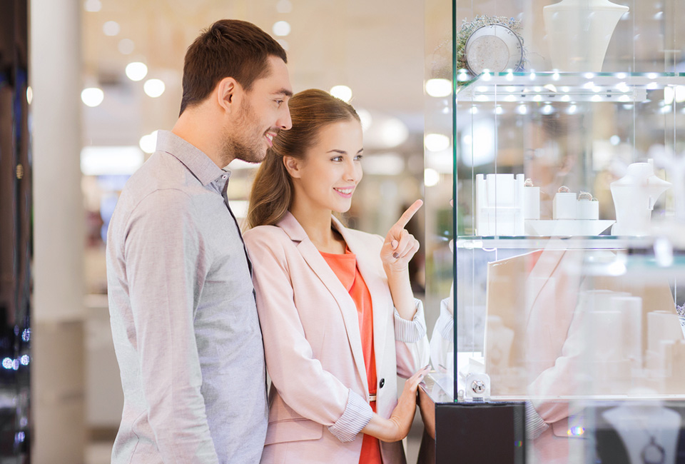 a couple shopping for rings together