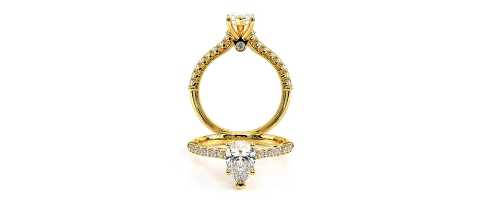 a renaissance engagement ring in rose gold
