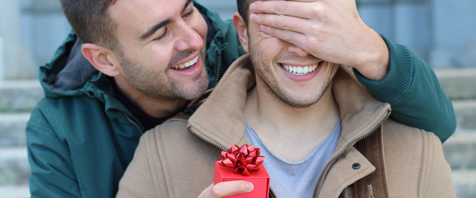 man proposing to boyfriend covering eyes