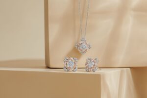 white and rose gold floret diamond pendant and stud earrings